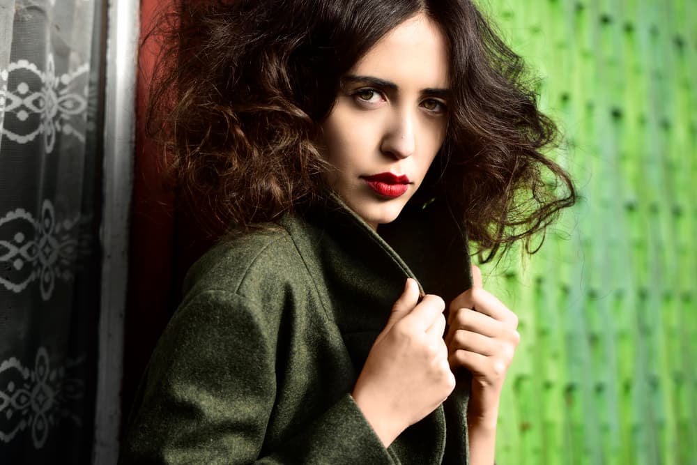Red Lips Green Coat by Alexandra Fira — canvas wall art