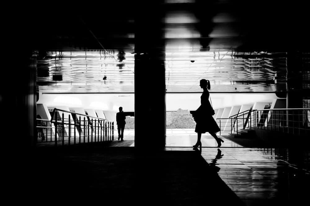 Elegant Silhouettes Walking by Evelin Dobrev — canvas wall art