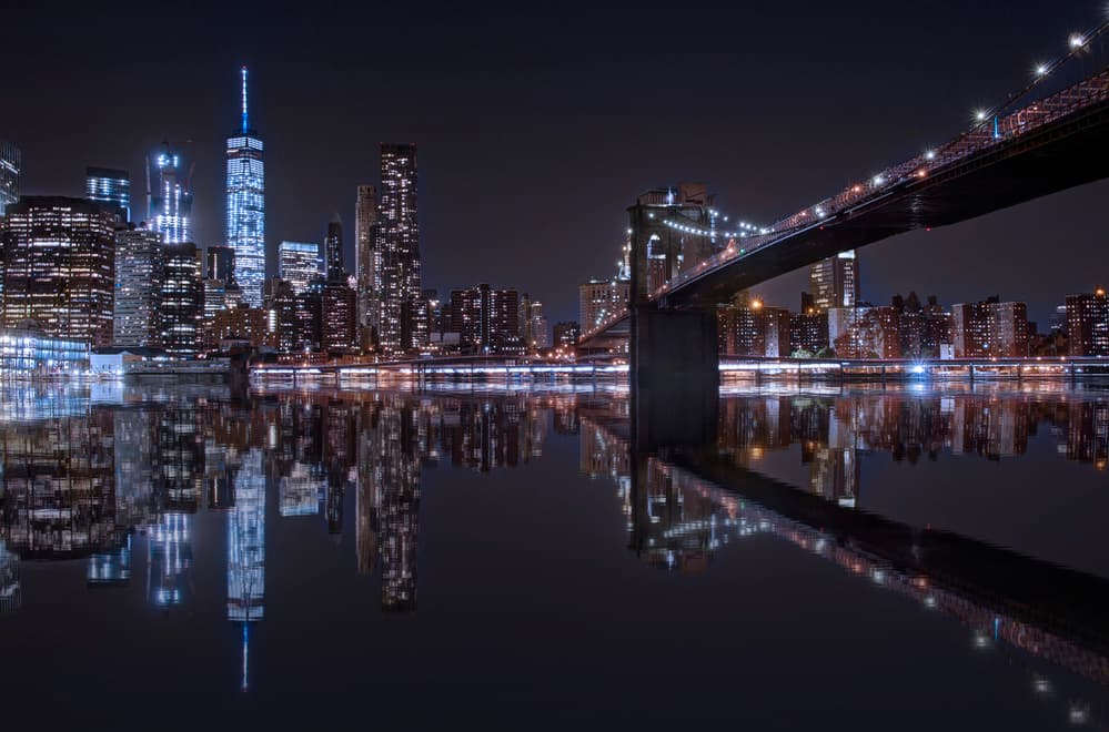 Manhattan Skyline River Lights by Carles Just — canvas wall art