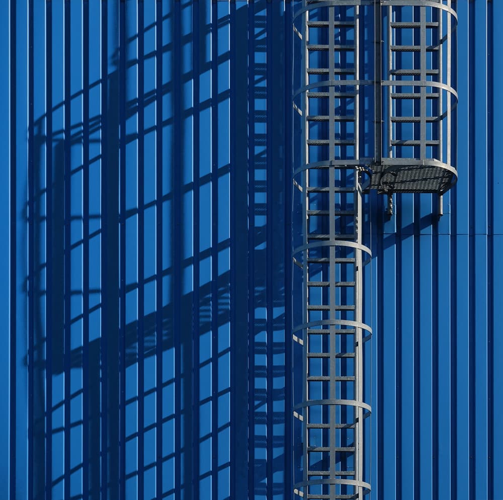 Blue Ladder Geometric Shadows by Hans-Wolfgang Hawerkamp — canvas wall art