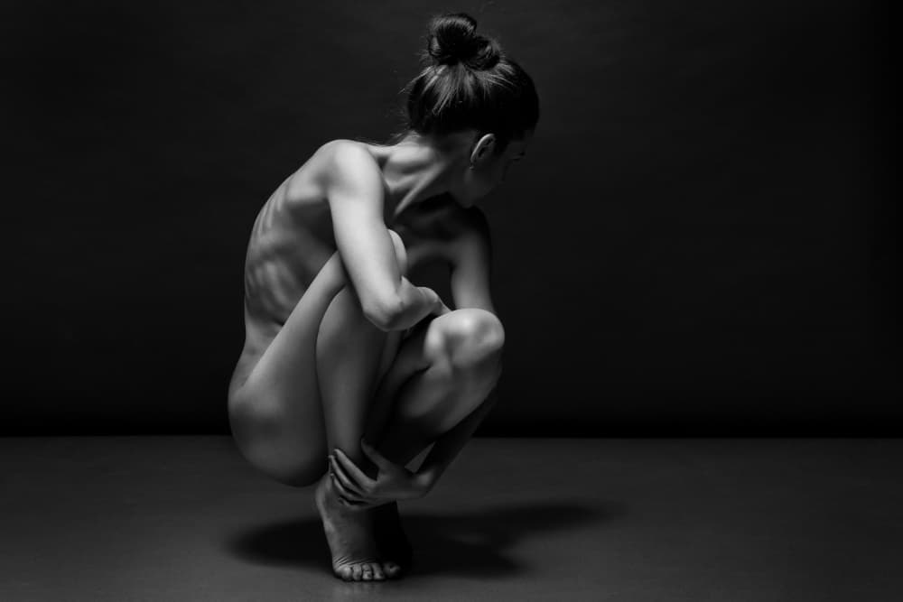 Crouching Female Form by Anton Belovodchenko — canvas wall art