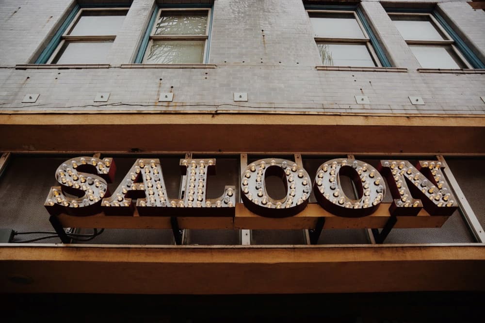 Vintage Saloon Sign by Del Mundo Imagery — canvas wall art
