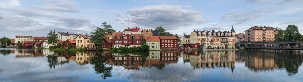 Colorful City River Reflections by Arne Östlund — canvas wall art