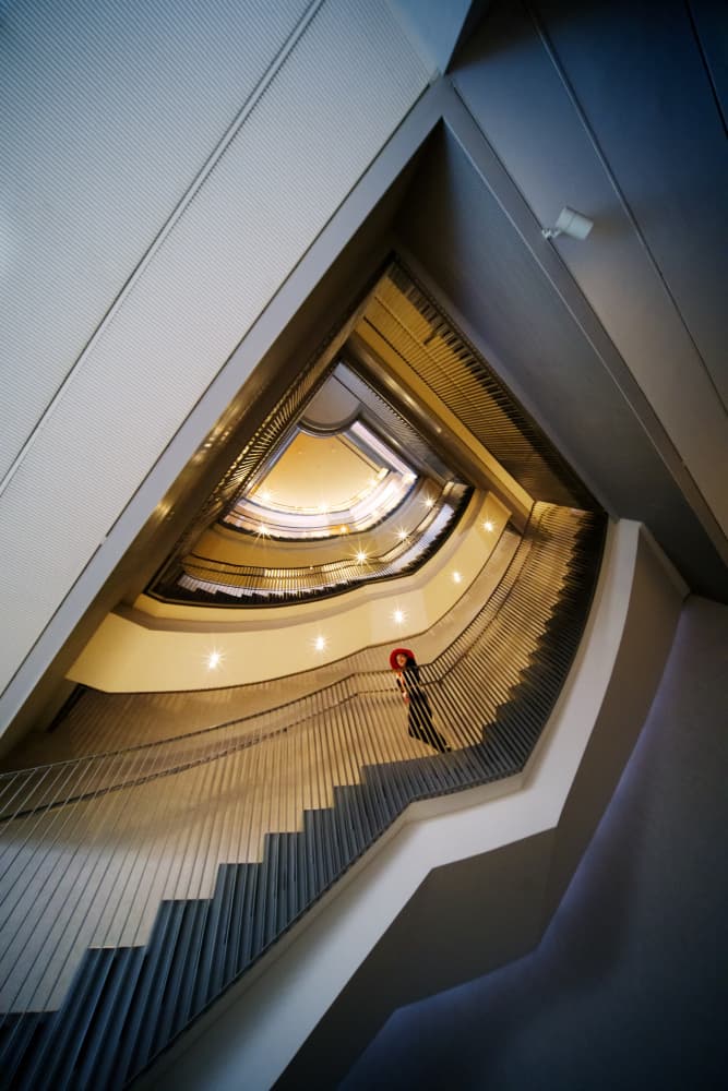 Red Hat on Modern Stairs by konglingming — canvas wall art