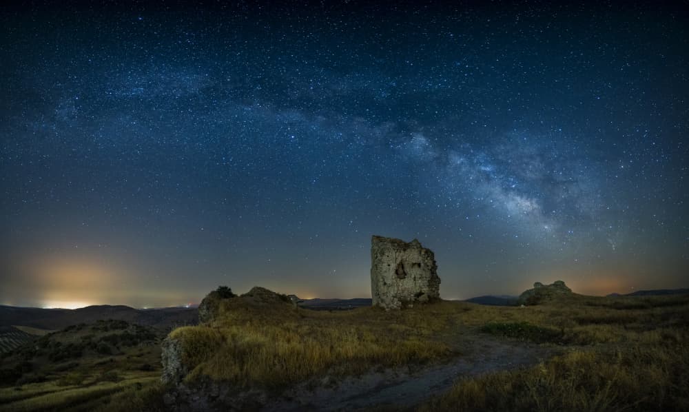 Milky Way Over Ancient Ruins by JUAN CARLOS HERVÁS MARTÍNEZ — canvas wall art
