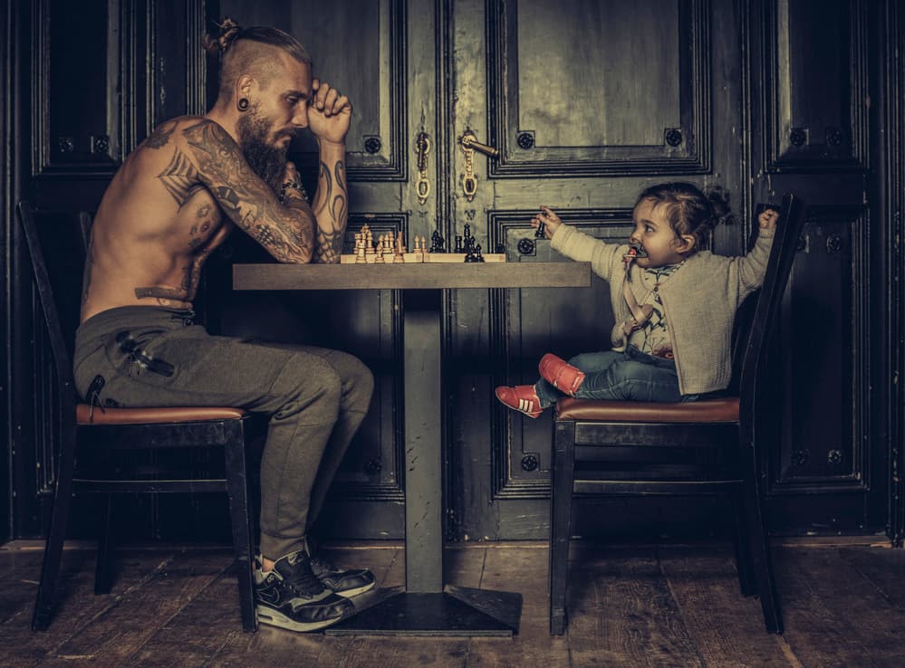 Man Child Chess Game by gNo — canvas wall art