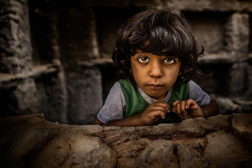 Young Boy's Gaze by FATHI ALDARWISH — canvas wall art