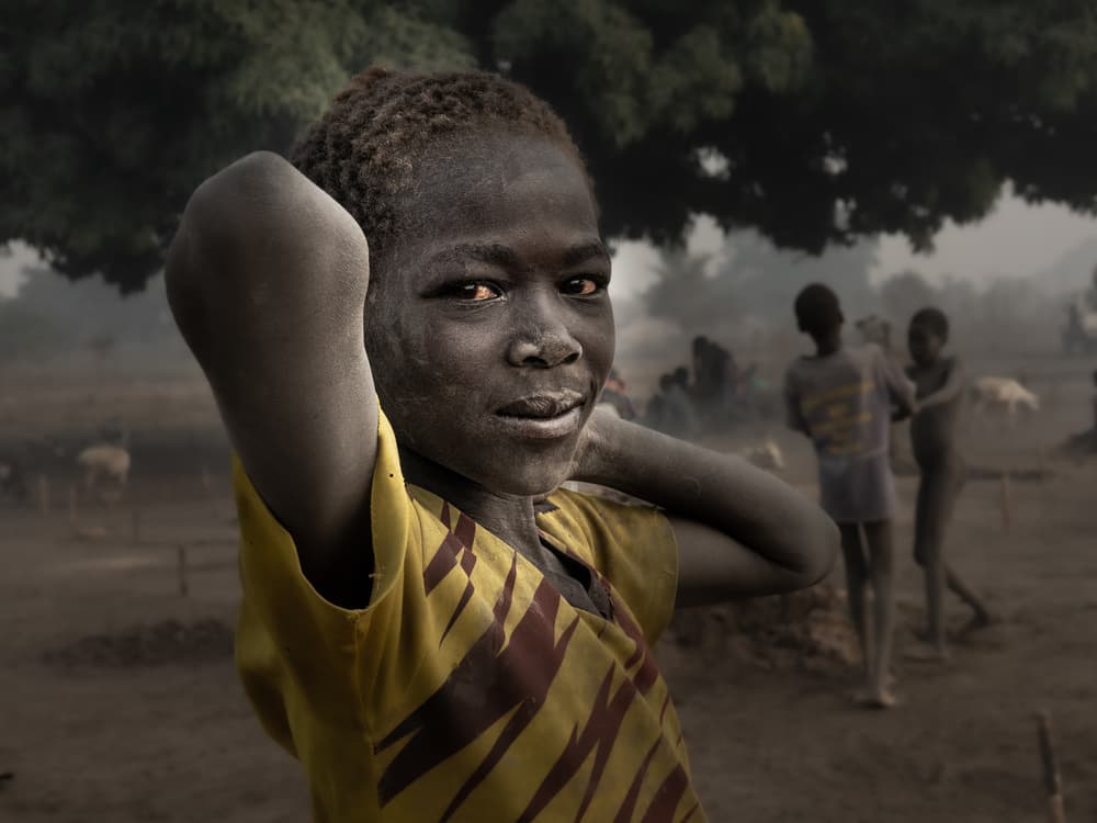 Smiling Village Boy by Elena Molina — canvas wall art