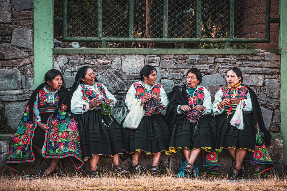 Colorful Indigenous Women by Marco Tagliarino — canvas wall art