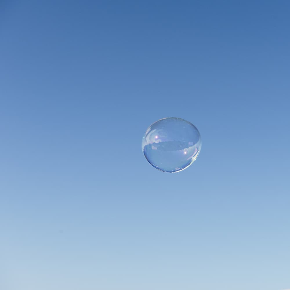 Floating Blue Bubble by Lynann Colligan — canvas wall art