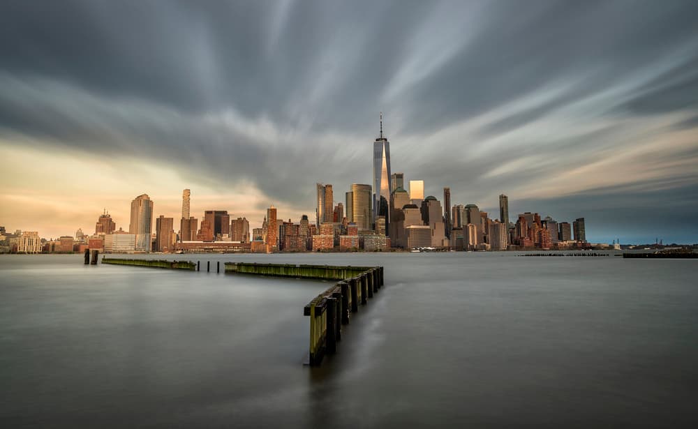Manhattan Skyline Glow by Álvaro Pérez &amp Jose M. Pérez. Brothers — canvas wall art