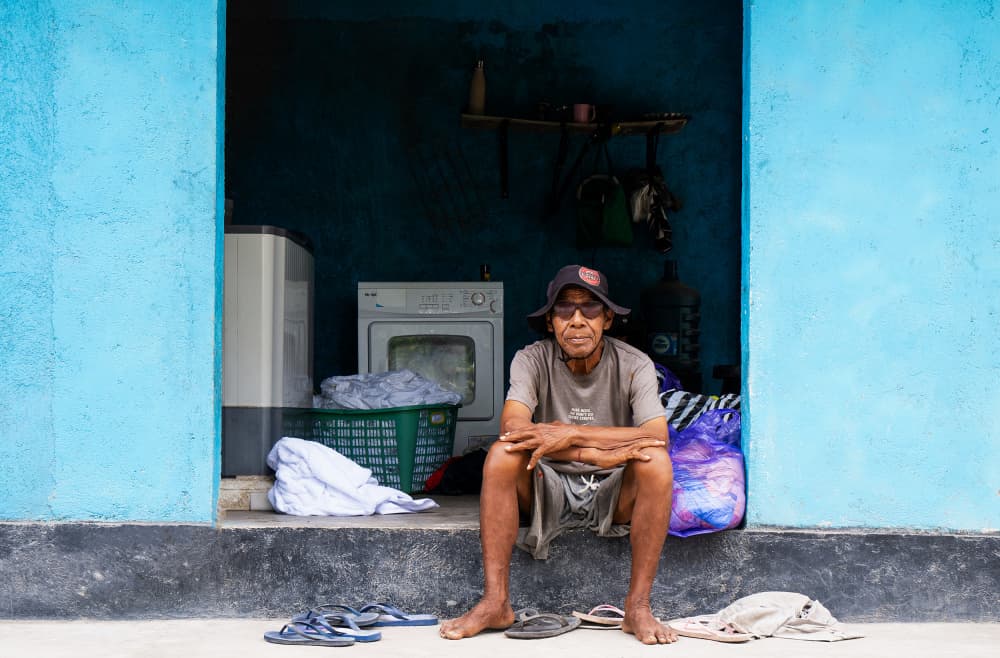 Man in Blue Doorway by Streiff Marcel — canvas wall art