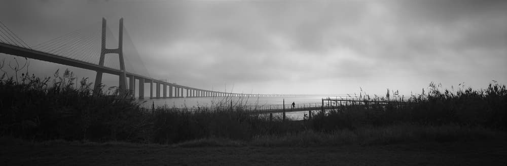 Misty Bridge Solitude by Raul Pires Coelho — canvas wall art