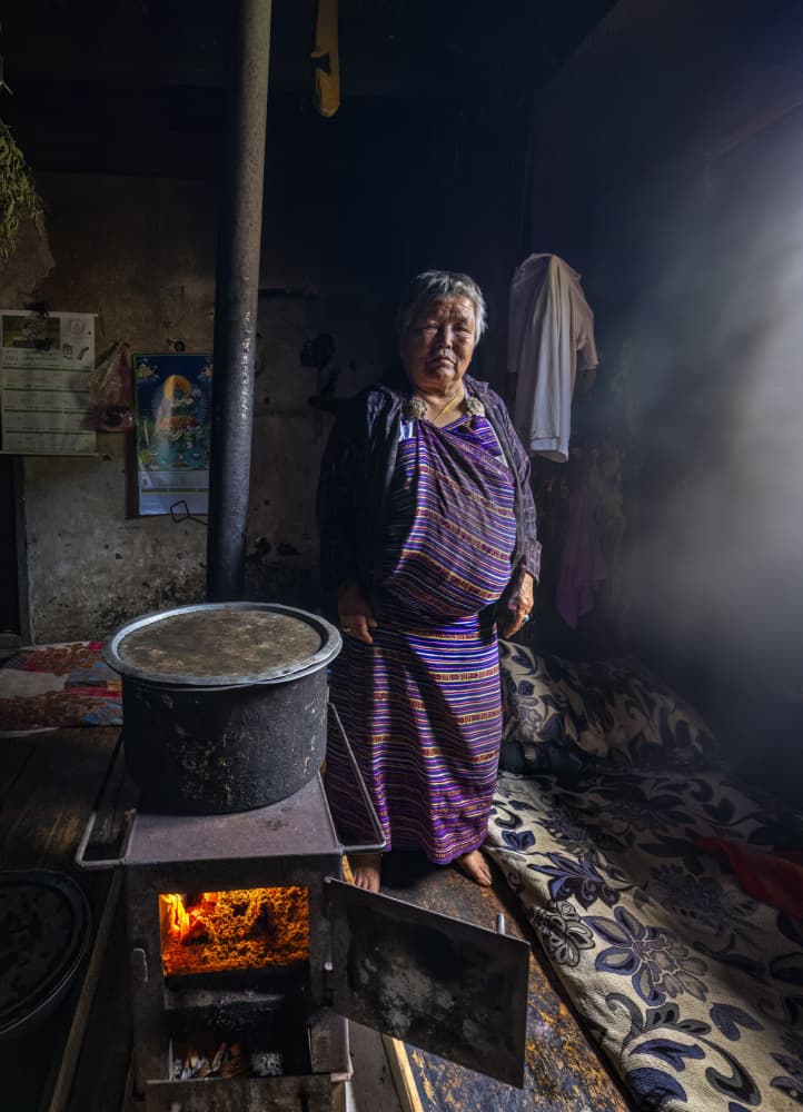 Elderly Woman Cooking Fire by Raimondo Restelli — canvas wall art