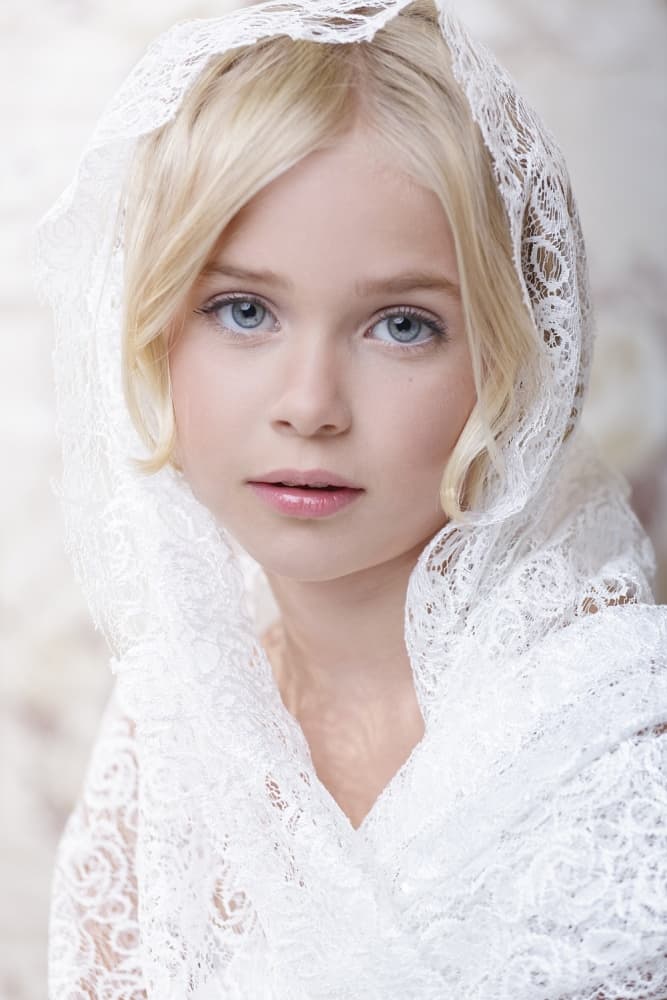 Serene Child in Lace by Carine Belzon — canvas wall art