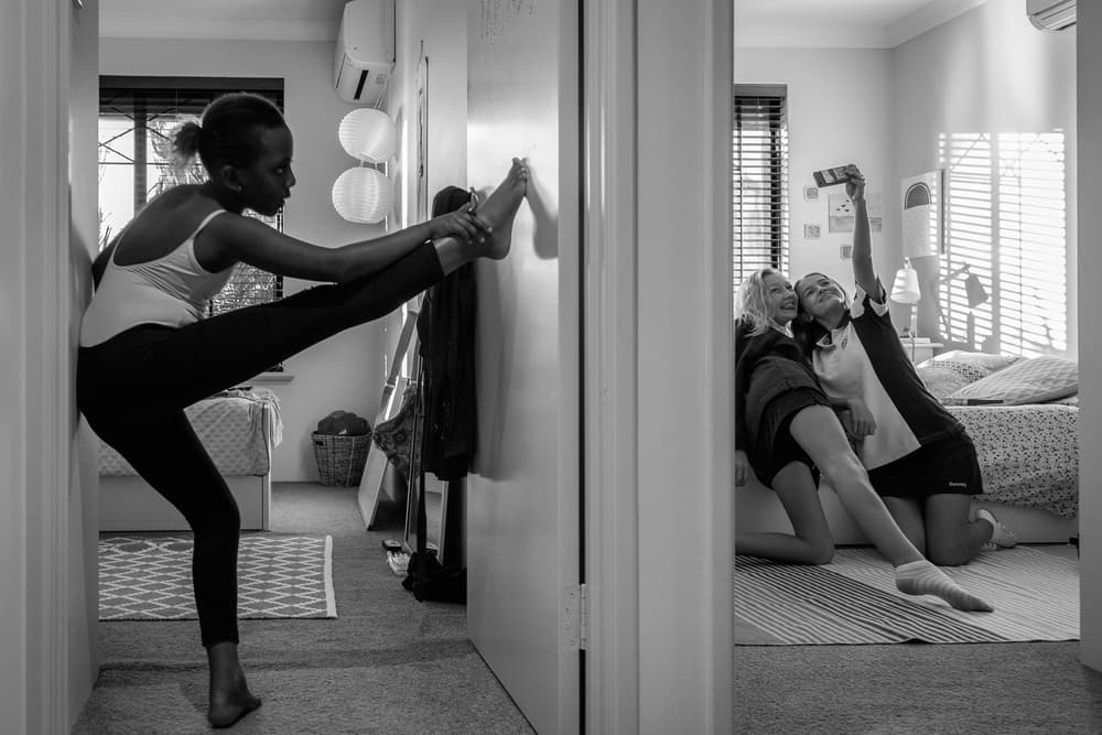Teen Girls Stretching Selfie by Gloria Salgado Gispert — canvas wall art