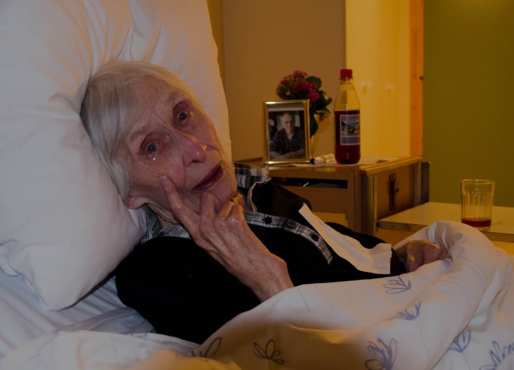 Elderly Woman Crying by Mette Caroline Strøksnes — canvas wall art