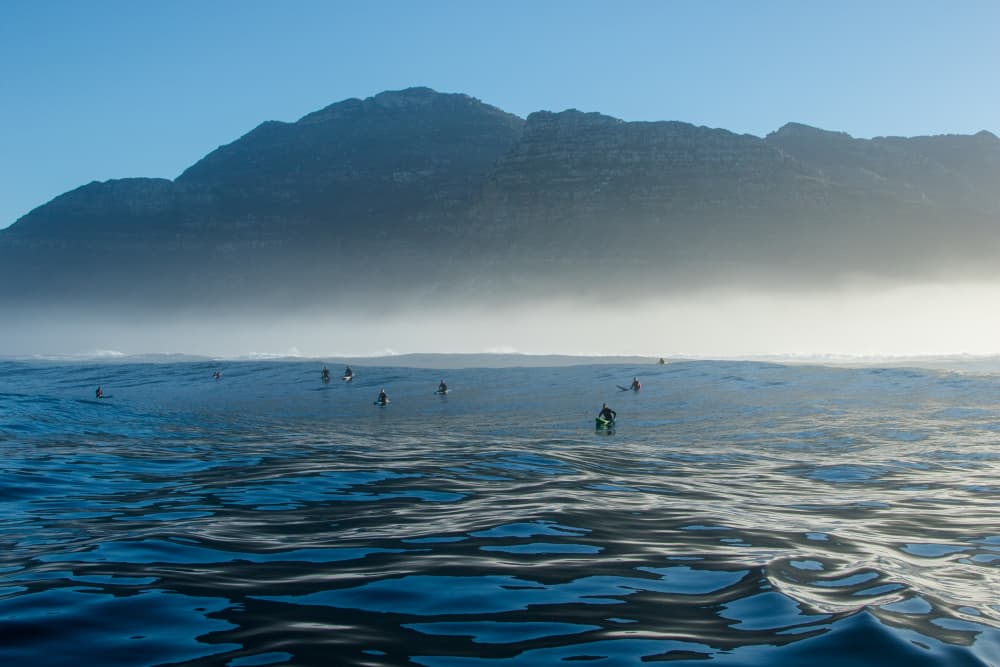 Misty Mountain Surfers by Anthony Fox — canvas wall art