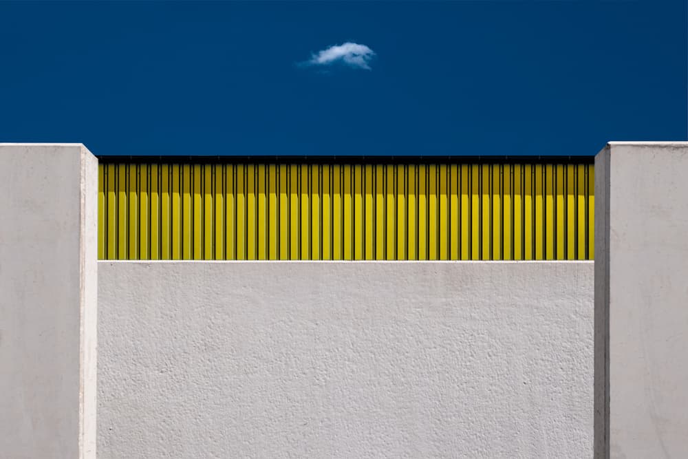 Blue Sky Yellow Wall by Rolf Endermann — canvas wall art