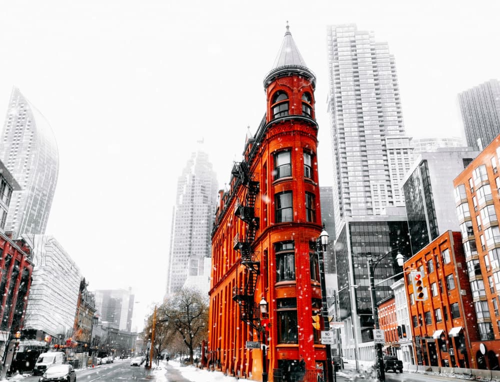 Toronto's Red Flatiron Winter by Jasmine Zhang — canvas wall art