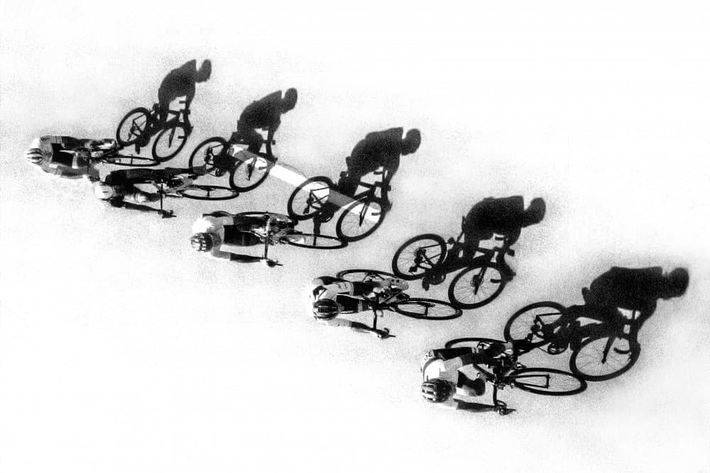 Speeding Cyclists Shadows by Michel Groleau — canvas wall art