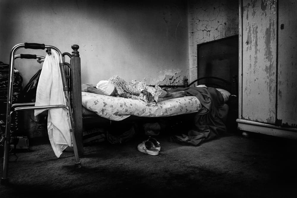 Somber Bedroom Interior by Rami Al Adwan — canvas wall art