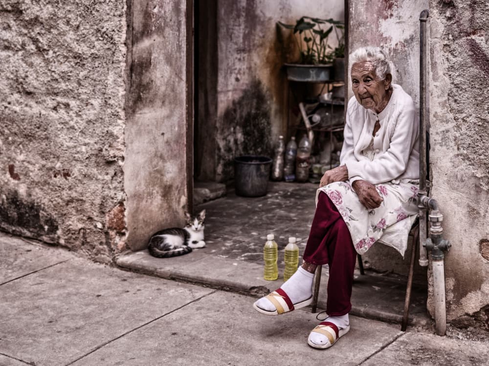 Elderly Woman Street Scene by Pavol Stranak — canvas wall art