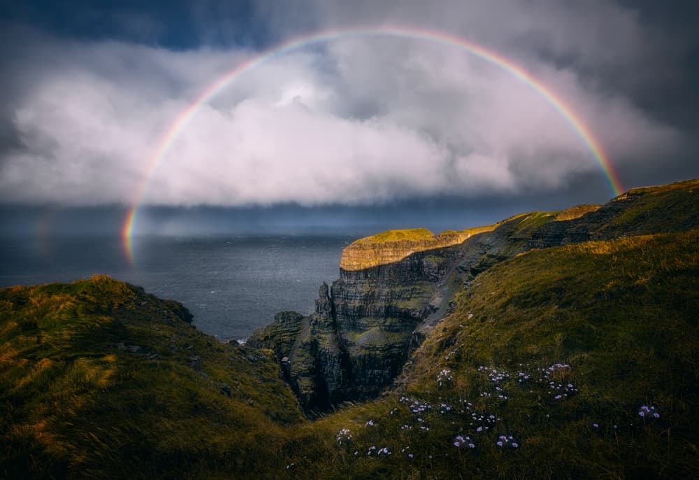 Rainbow Over Wild Cliffs by Ben.C.L — canvas wall art