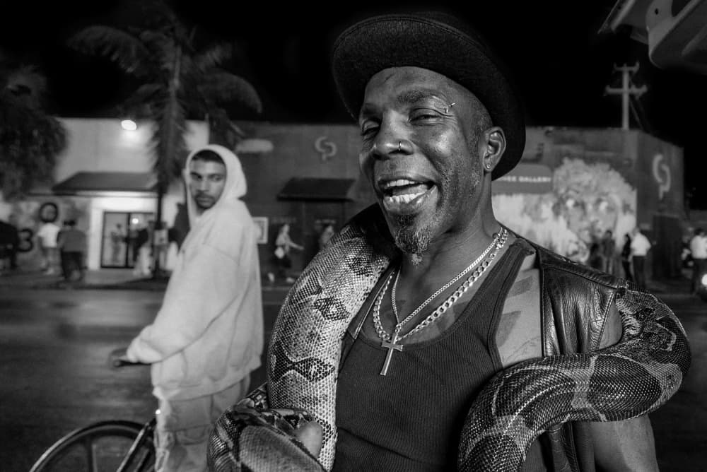 Smiling Man with Python by Alfred Forns — canvas wall art
