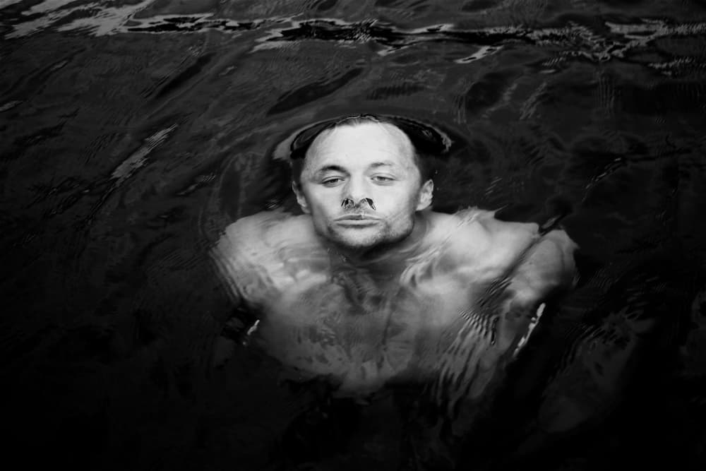 Man's Watery Portrait by Jørgen Wicklow — canvas wall art