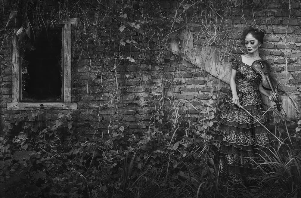 Melancholy Violinist by Rooswandy Juniawan — canvas wall art