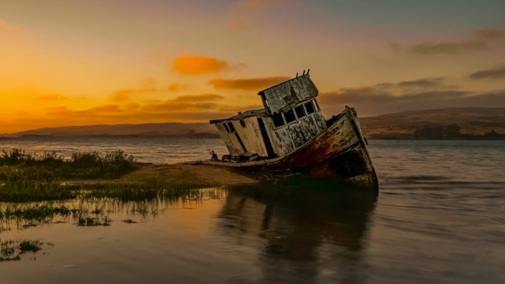 Old Shipwreck Sunset by Annie Zhang — canvas wall art