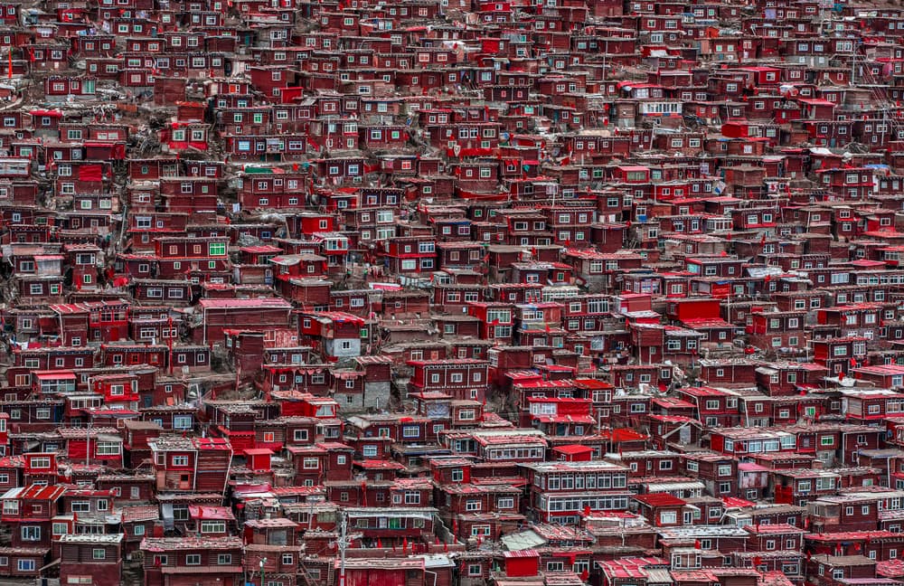 Red Tibetan Monastery Village by Ali Al-Jazeri — canvas wall art