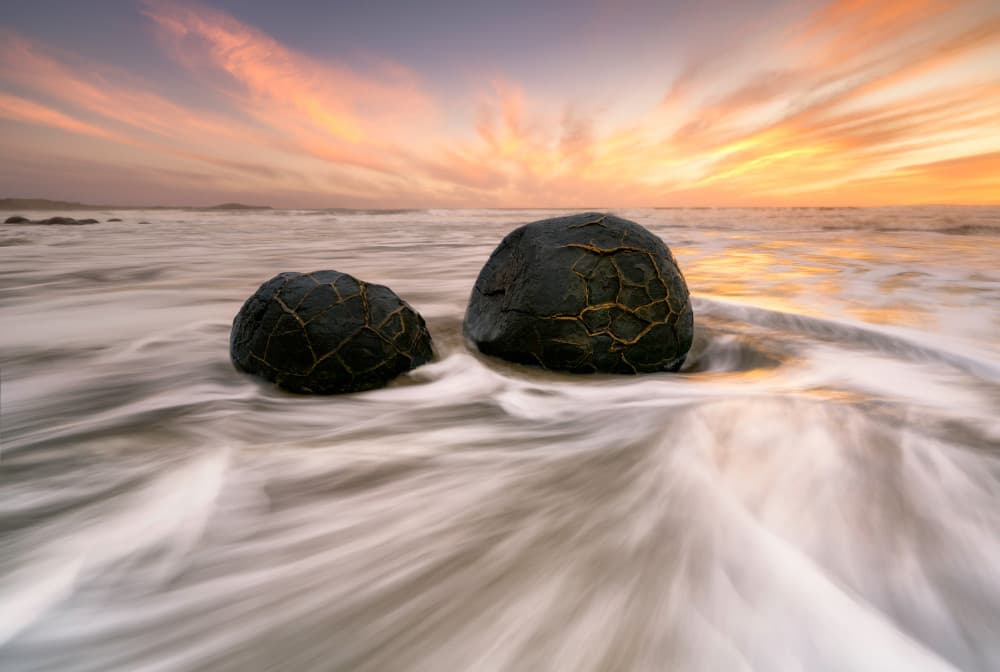 Beach Rocks Sunset Glow by Jingshu Zhu — canvas wall art