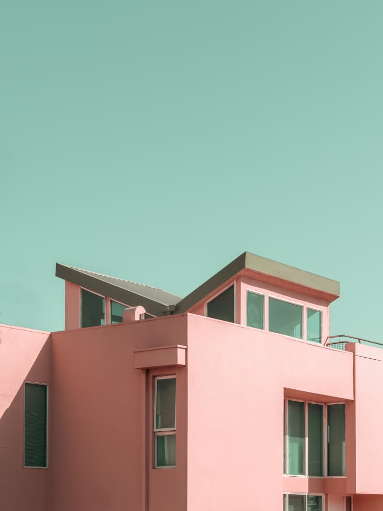 Pink Building Teal Sky by David Chiodo — canvas wall art
