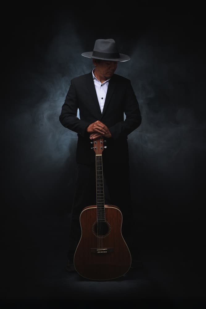 Pensive Musician by Ihsan M — canvas wall art