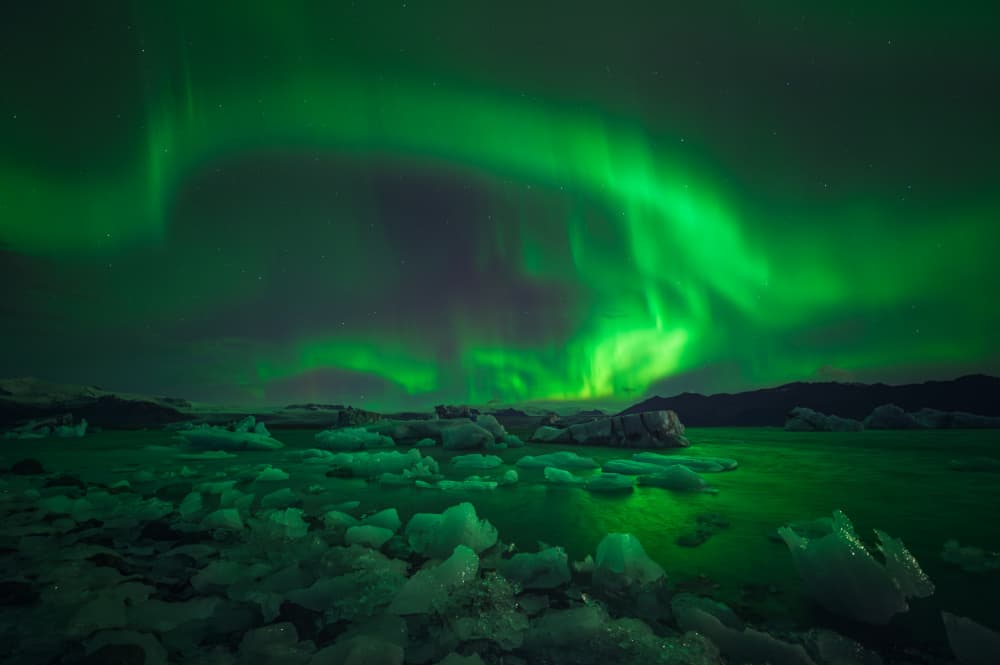 Northern Lights Ice Lake by David Martin Castan — canvas wall art