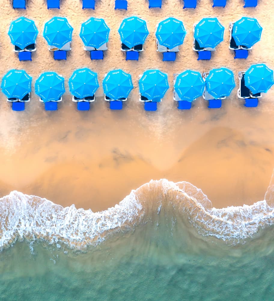 Aerial Blue Umbrellas Beach by Gilad Topaz — canvas wall art