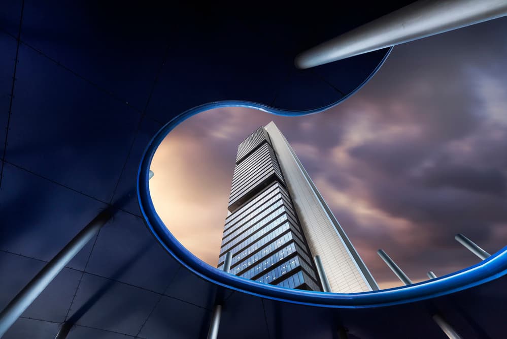 Skyscraper Through Blue Frame by Jorge Ruiz Dueso — canvas wall art