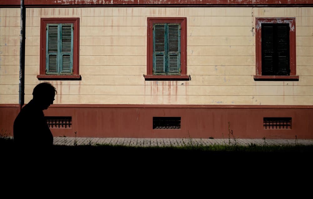 Shadow Man Old Building by Vincenzo Barone — canvas wall art