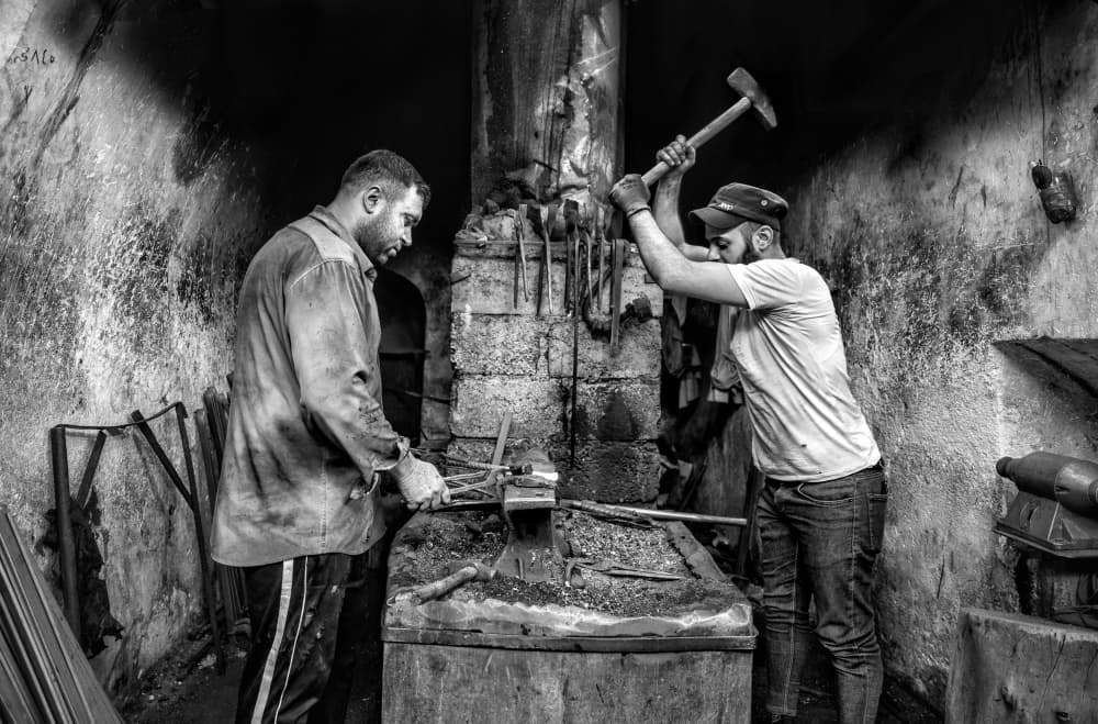 Blacksmiths At Work by Bashar Alsofey — canvas wall art