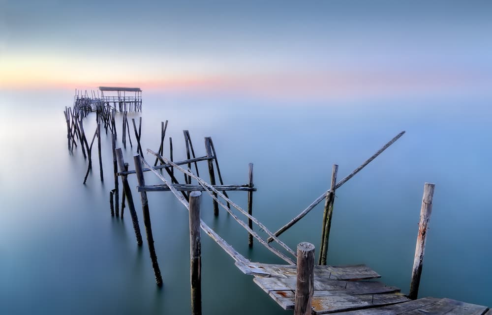 Serene Wooden Pier by Fran Osuna — canvas wall art