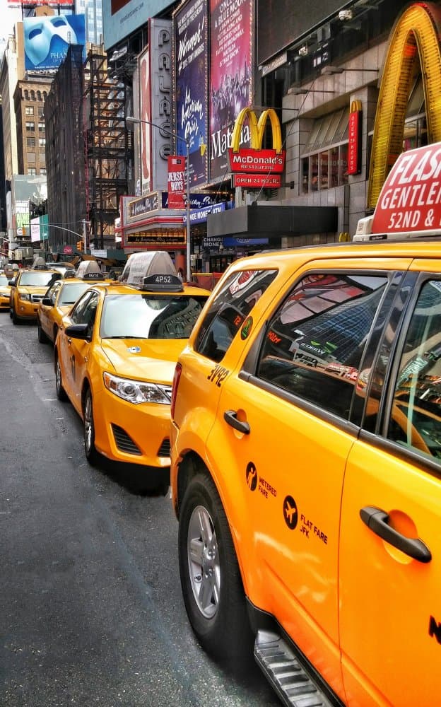 New York City Taxis by Kobbie Pessach — canvas wall art
