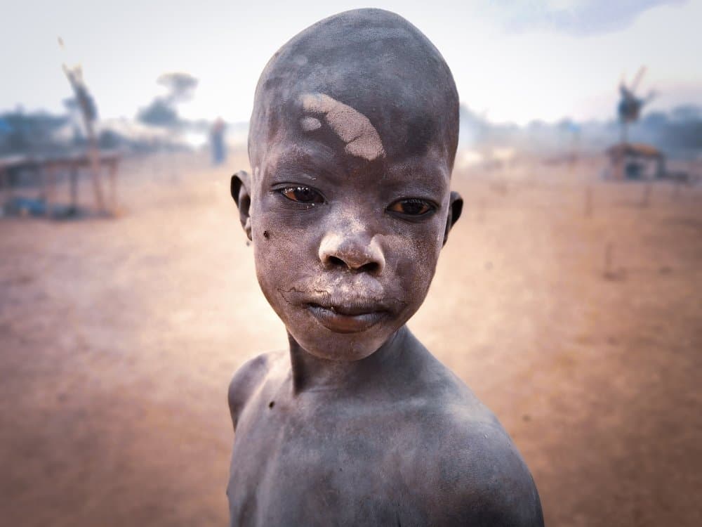 African Boy's Gaze by Svetlin Yosifov — canvas wall art