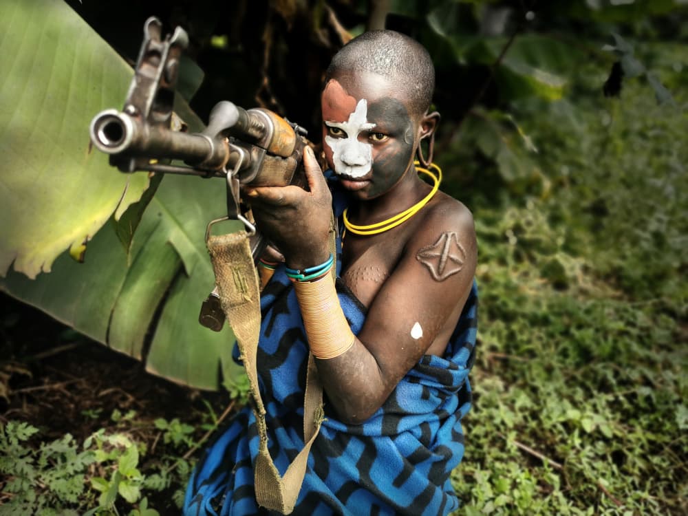 Tribal Warrior with Rifle by Svetlin Yosifov — canvas wall art