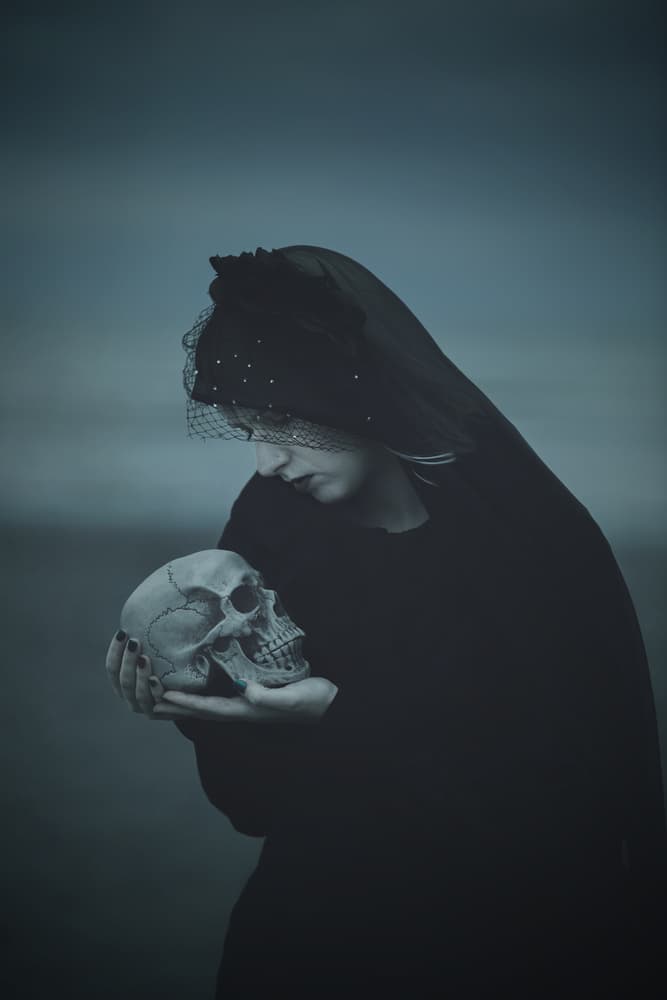 Veiled Woman Holding Skull by Magdalena Russocka — canvas wall art