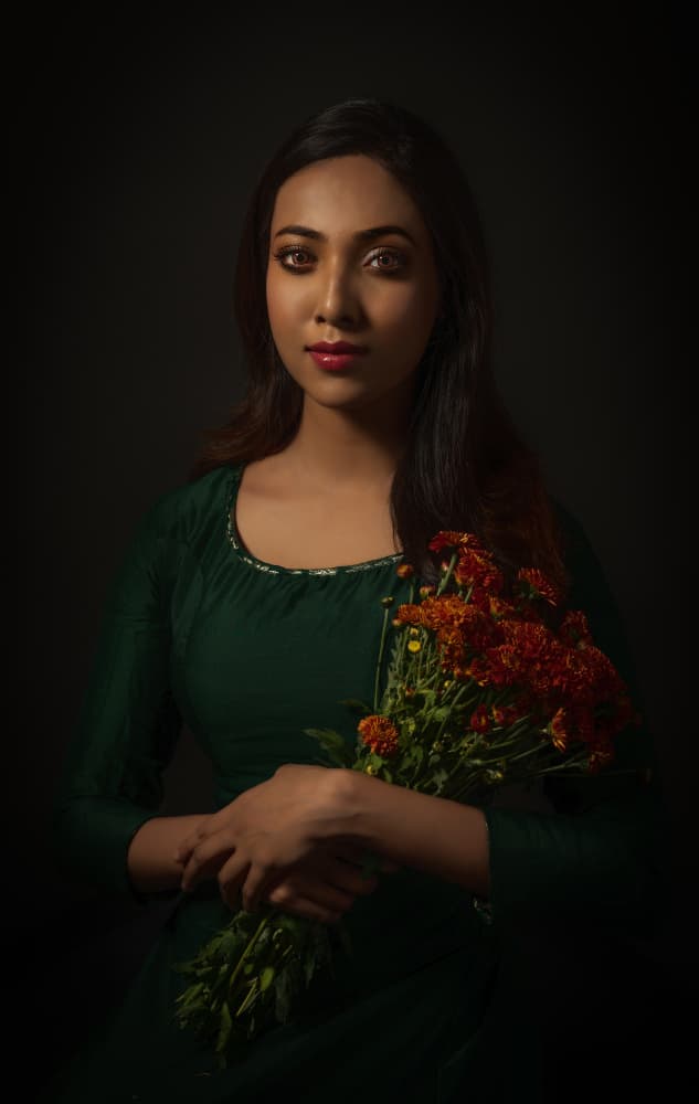 Serene Woman with Flowers by Nilendu Banerjee — canvas wall art