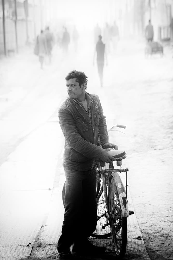 Pensive Man on Dusty Street by Giovanni Cavalli — canvas wall art