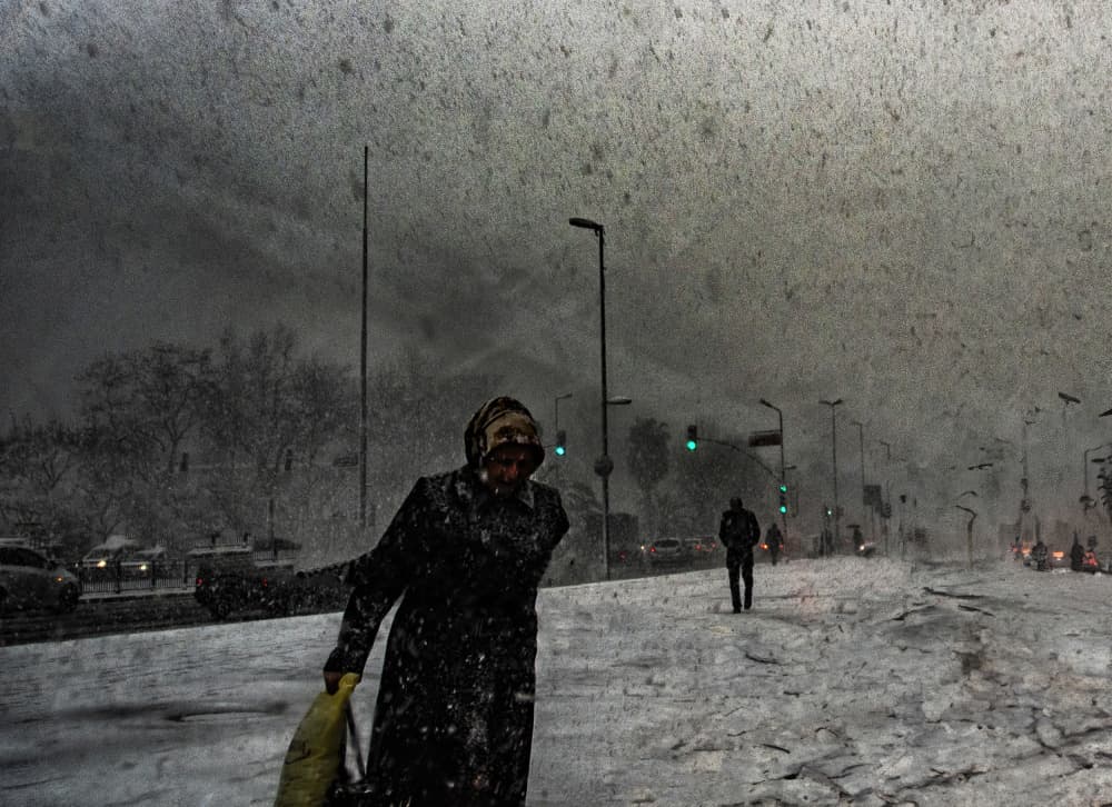 Snowy City Walk by Ömer Ates Kızıltug — canvas wall art