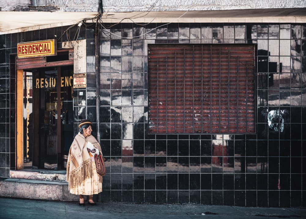 Traditional Woman City Street by Marco Tagliarino — canvas wall art
